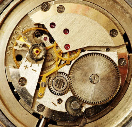 Closeup of old metal clock mechanismの写真素材