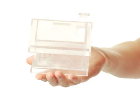The house in human hand on whiteの写真素材