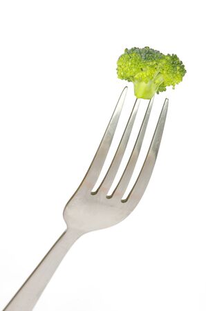 fork and broccoli on whiteの写真素材