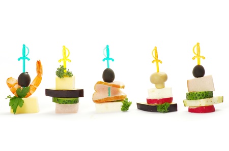 Close-up of canape with olives, cheese and over whiteの写真素材