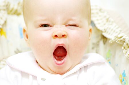 portrait of a beautiful baby on a whiteの写真素材