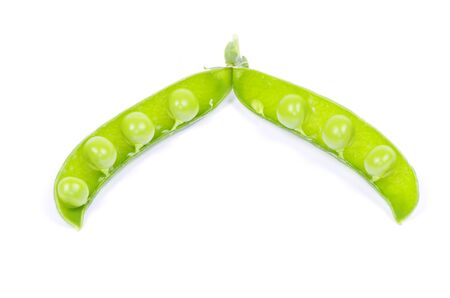 green peas vegetable closeup isolated on whiteの写真素材