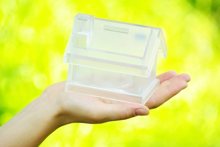 The house in human handの写真素材