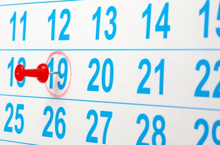 Red circle on a calendar concept for an important dayの写真素材