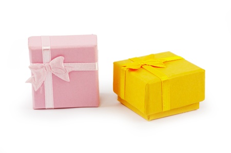 Christmas box gifts with satin bow isolated on white backgroundの写真素材