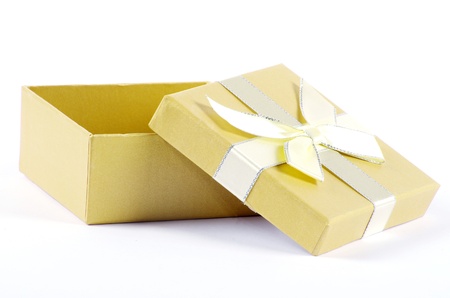 Christmas box gifts with satin bow isolated on white backgroundの写真素材