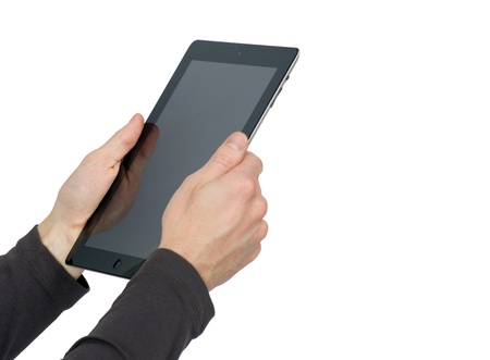 hands are holding the tablet computerのeditorial素材