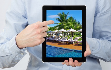 hands holding the tablet computerの写真素材