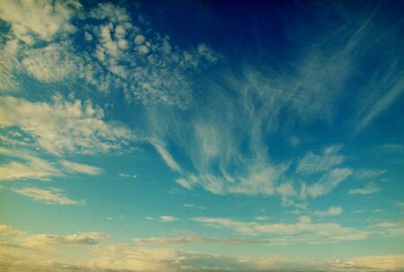 blue sky background with tiny clouds