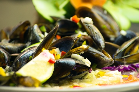 Salad from a mussel with fish and vegetablesの写真素材
