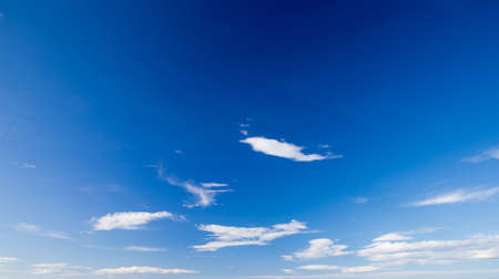 blue sky background with tiny cloudsの写真素材