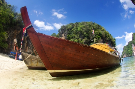 Tropical beach, longtail boats, Andaman Sea, Thailandの写真素材