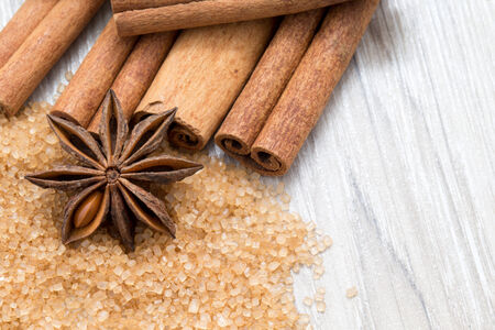 anise and cinnamon, on wooden tableの写真素材