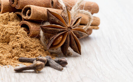 Cloves, anise and cinnamon isolated on white 