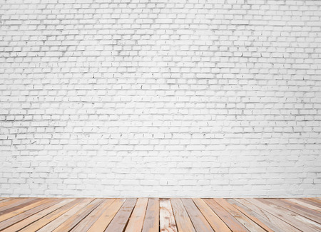 white brick wall and wood floor backgroundの写真素材
