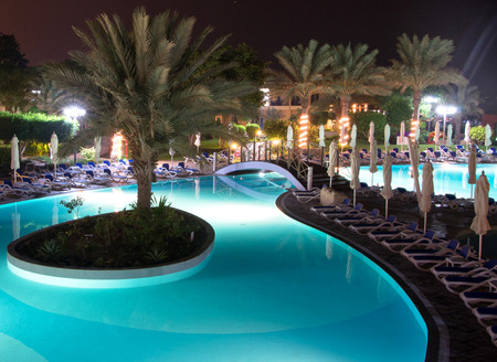 swimming pool in night illuminationのeditorial素材