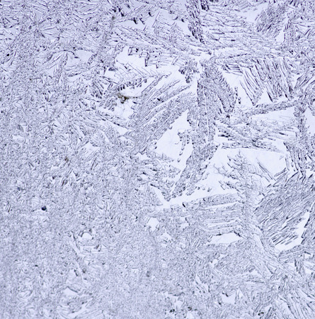 Frosty natural pattern on winter window
