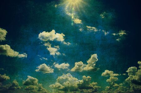 grunge background of a sky with cloudsの写真素材