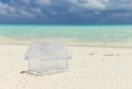 tropical beach in Maldives with few palm trees and blue lagoonの写真素材