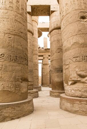 columns covered in hieroglyphics, Karnak, Egypt.