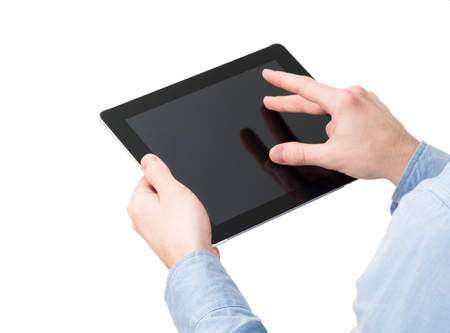 hands holding a tablet touch computer gadget with isolated screenの写真素材