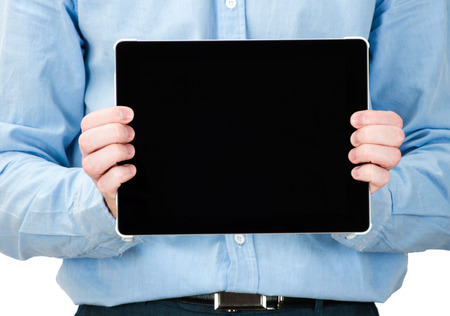 hands holding a tablet touch computer gadget with isolated screen