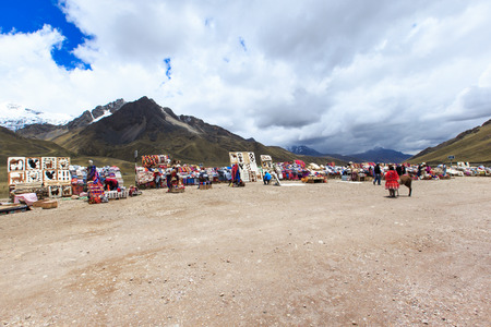 PERU - SEPTEMBER 6, 2015: Unidentified women selling the traditional local textile items on the La...