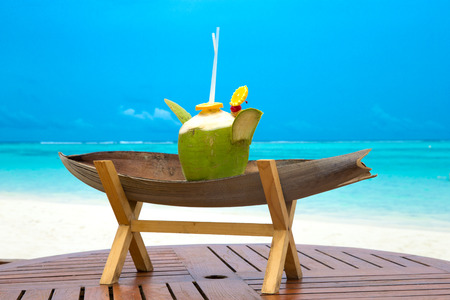 cocktail with blur beach on background