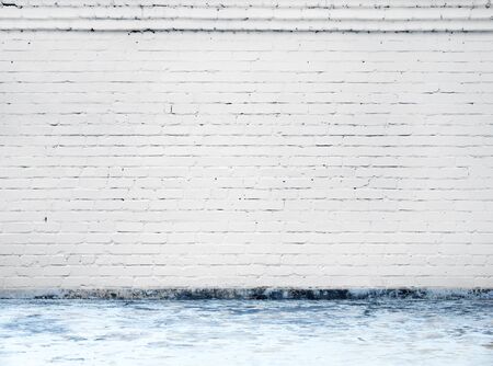 white brick wall background in rural roomの写真素材