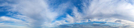 Blue Sky background with tiny Clouds. Panorama backgroundの写真素材