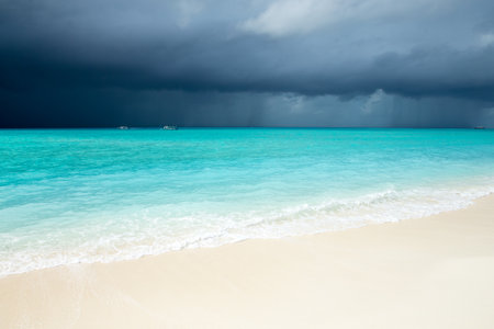 tropical Maldives island with white sandy beach and seaの写真素材