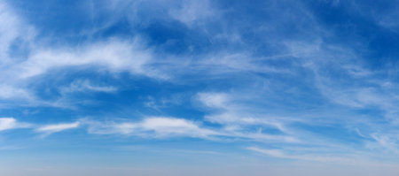 Blue Sky background with tiny Clouds. Panorama backgroundの写真素材