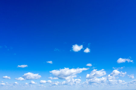 blue sky background with tiny cloudsの写真素材