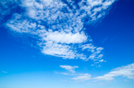 blue sky background with tiny cloudsの写真素材