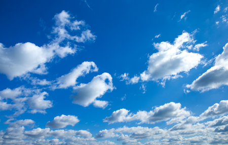 blue sky background with tiny cloudsの写真素材