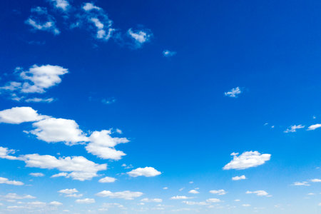 blue sky background with tiny cloudsの写真素材