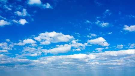 Blue sky with white clouds.の写真素材