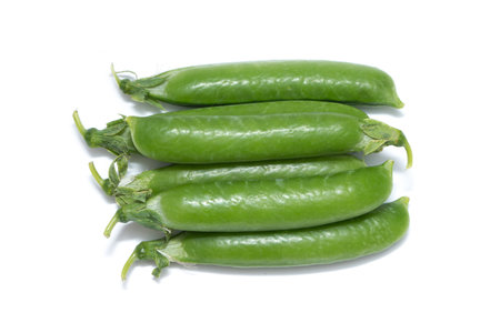 green peas on a white backgroundの写真素材