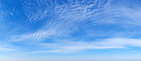 Blue Sky background with tiny Clouds. panorama backgroundの写真素材