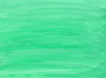 green watercolor background. hand painted by brushの写真素材