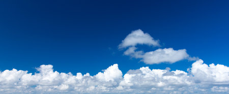 blue sky background with tiny cloudsの写真素材