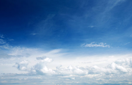 blue sky background with tiny cloudsの写真素材
