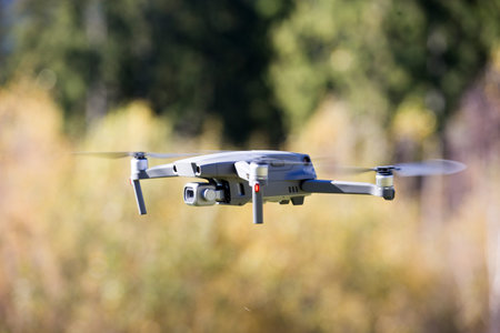 The drone copter flying with digital camera.