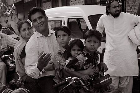 PAKISTAN_KARACHI_Family life ,five family members of small motorbike  and  dangerous ride family without helmet tdoay  20 April 2012  (PHOTO BY ILYAS DEAN/PAK IMAGES} 
のeditorial素材