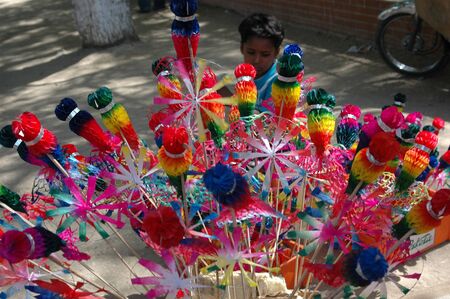 PAKISTAN_KARACHI_Young boy sells pin wheels for children today 24 April 2012   のeditorial素材