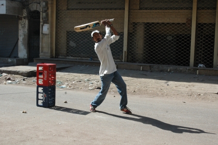 KARACHI/PAKISTAN_  Pakistani playing circket on street Cricket sport is in Pakistani blood ...
