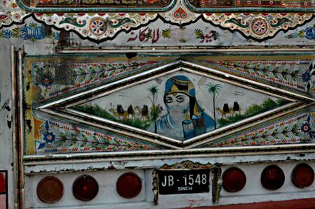 KARACHI/PAKISTAN_ Woem with hajib as art on bus  slagon reads long live Larkana 12 Nov. 2012    のeditorial素材