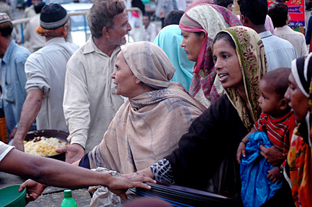 Karachi /Pakistan - BIlkees Edhi Lunger is wife of Edh and distribute free food during Ramadan this food is free with donation collected by people and for the people Free Food distribution center, 04 July 2014のeditorial素材