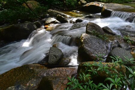 Waterfall in small riverの写真素材