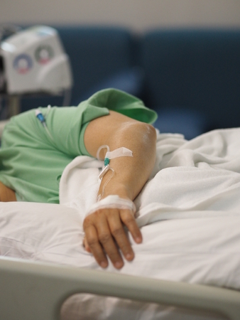 Hand Patients sleep to saline at the hospital wardの写真素材